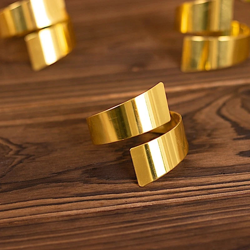Home Collection 4-Pack Gold Swirl Decorative Metal Napkin Rings